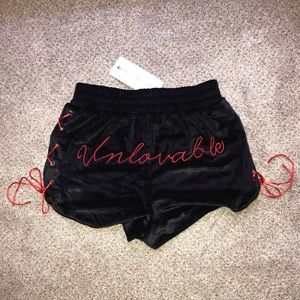 Black Velvet Shorts with Red Lace-Up Design